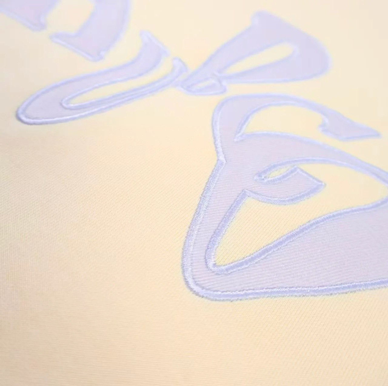 WARPED HUBCO TEE CREAM