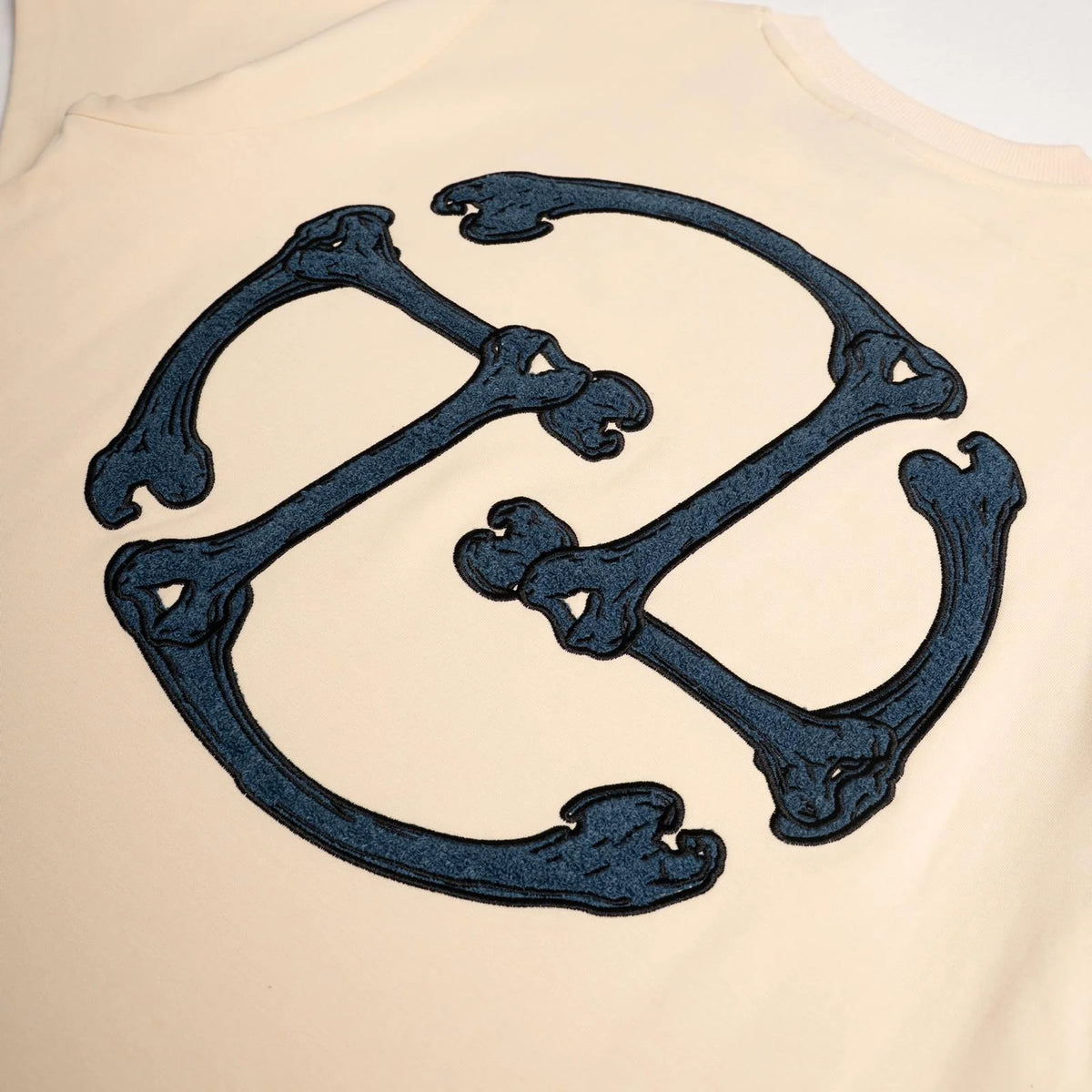 TNTCO SS26 Skeleton Logo Tee (Beige)